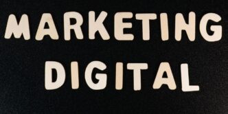 the words marketing and digital written on a black surface