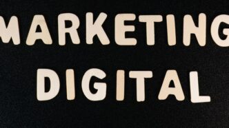 the words marketing and digital written on a black surface