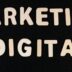 the words marketing and digital written on a black surface