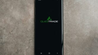 a close up of a cell phone on a table