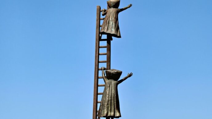 Statues of people climb a ladder to the sky.