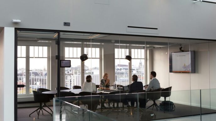 people sitting on chair inside building