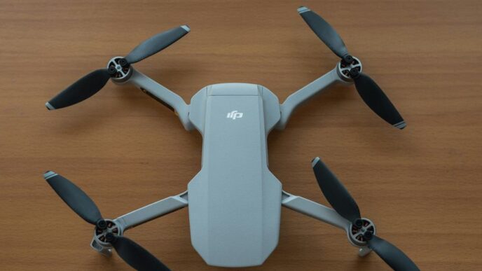 white and gray quadcopter drone