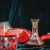 clear glass pitcher on table