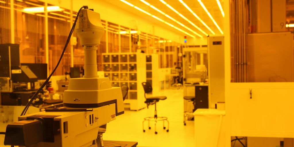 a lab with a microscope and other equipment