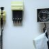 a white wall with a bunch of electrical equipment on it