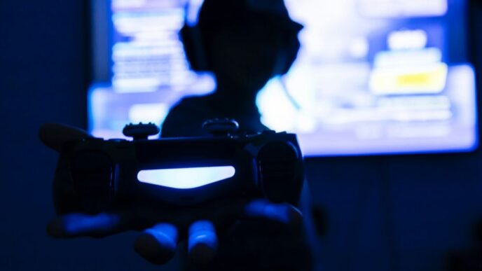silhouette of man holding camera