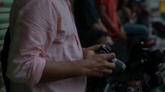 a man holding a watch