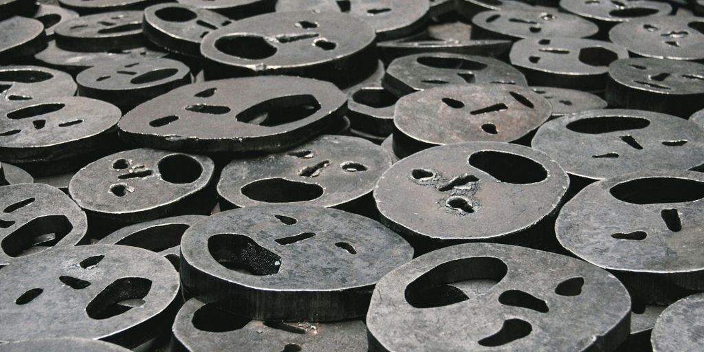 selective focus photography of face ornaments