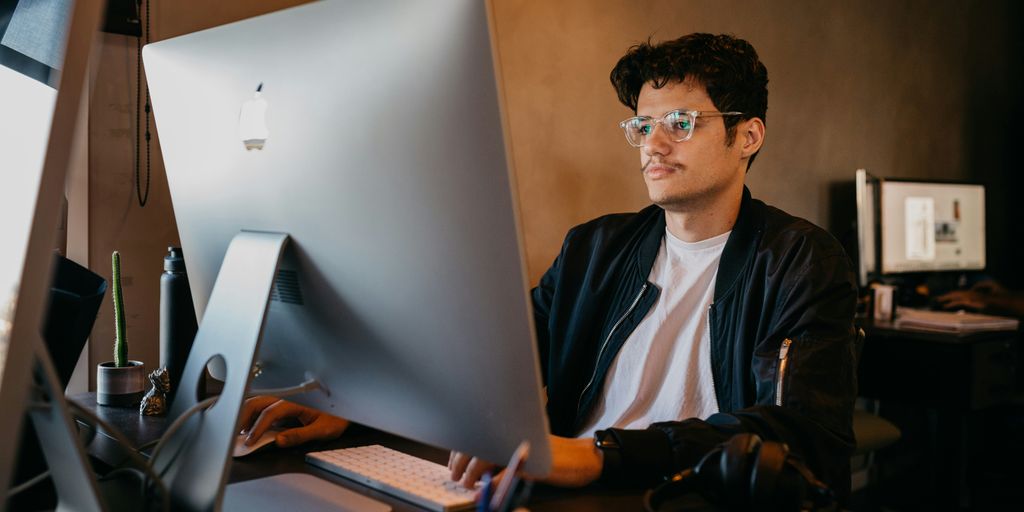 a man sitting at a desk
