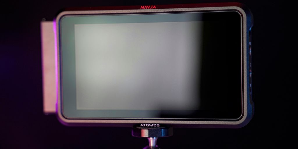 a close up of a camera on a tripod