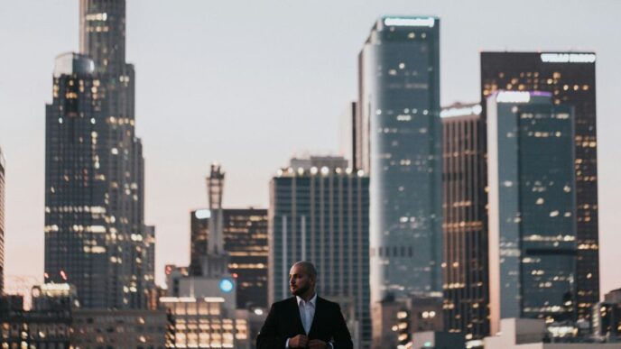 man in black jacket standing on top of building during daytime