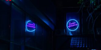 a building that has a neon sign on it