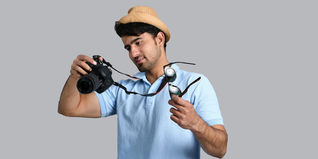 a man holding a camera