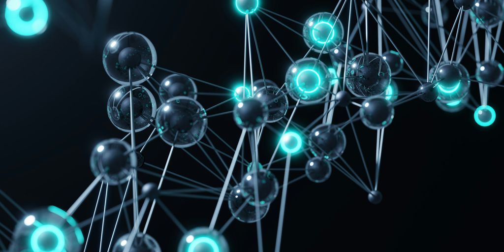 A group of blue and green balls on a black background