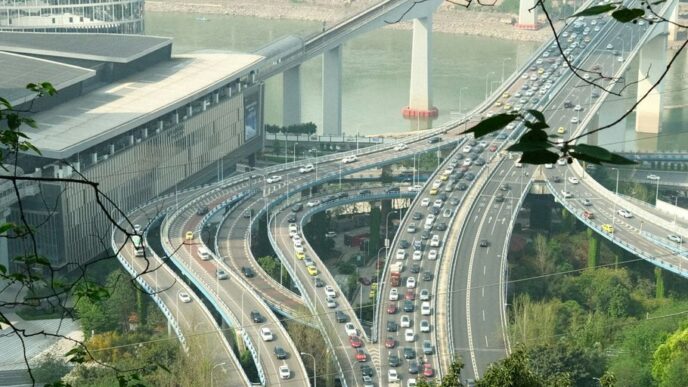 a view of a highway with a bridge in the background