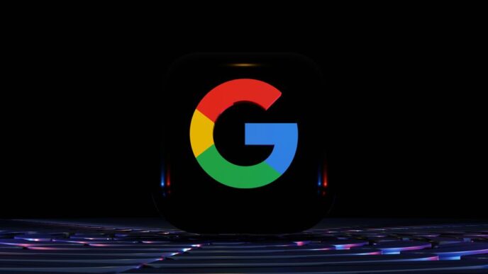 a close up of a computer keyboard with the google logo on it
