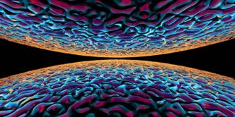 A close up of a cell phone with a black background