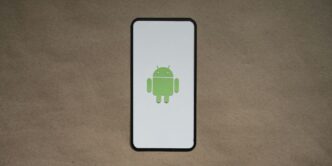 a cell phone with a green icon on it