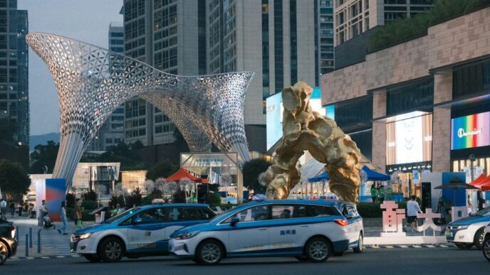 a giant statue of a giant creature in the middle of a city