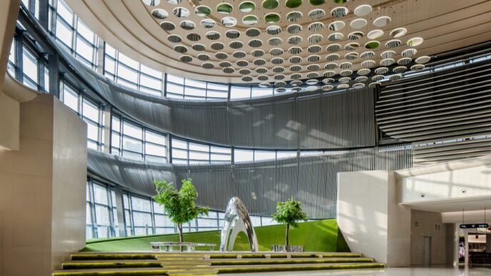A large room with a sculpture in the middle of it