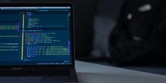 black laptop computer on white surface