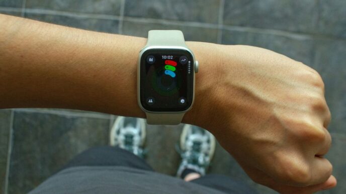 A wrist with an apple watch.