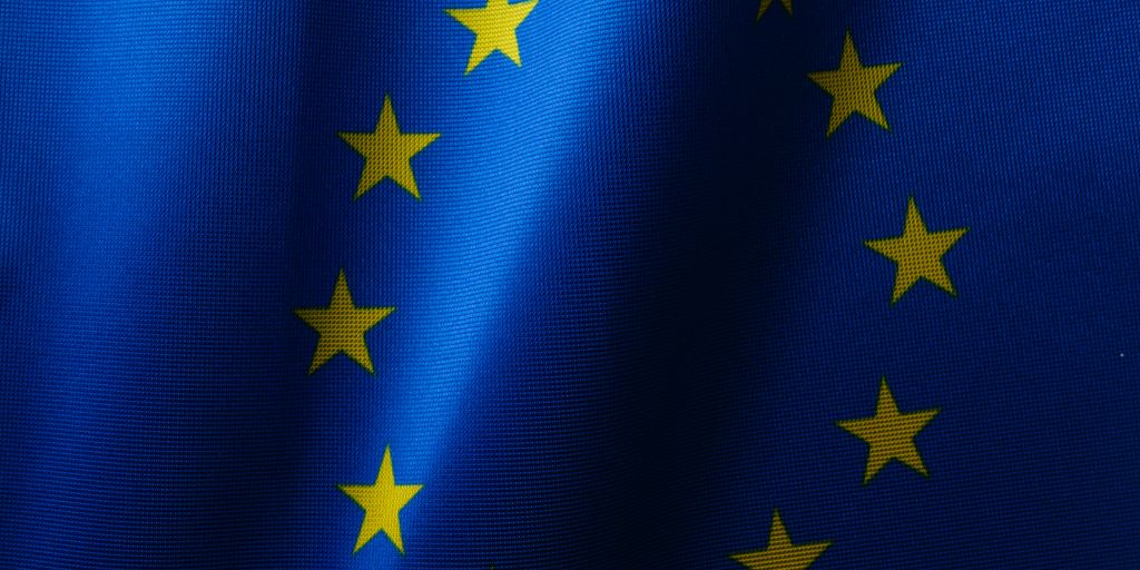 a close up of a blue and yellow flag