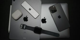 a couple of ipads sitting next to each other