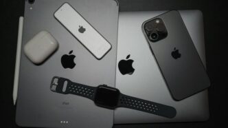 a couple of ipads sitting next to each other