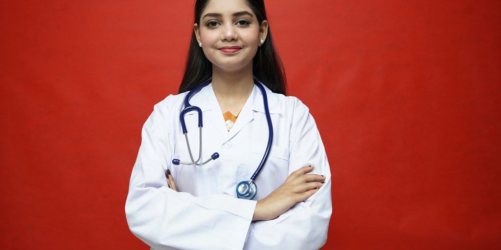 a woman in a white coat