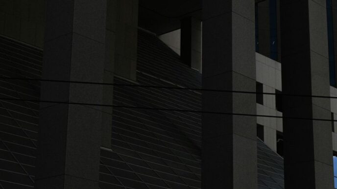 a clock on the side of a building at night