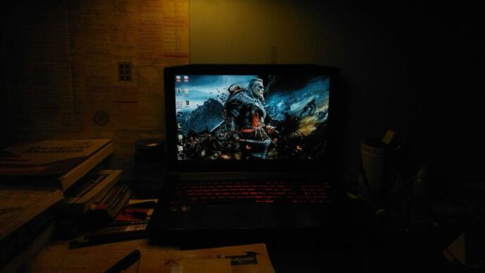 a laptop sits on a desk