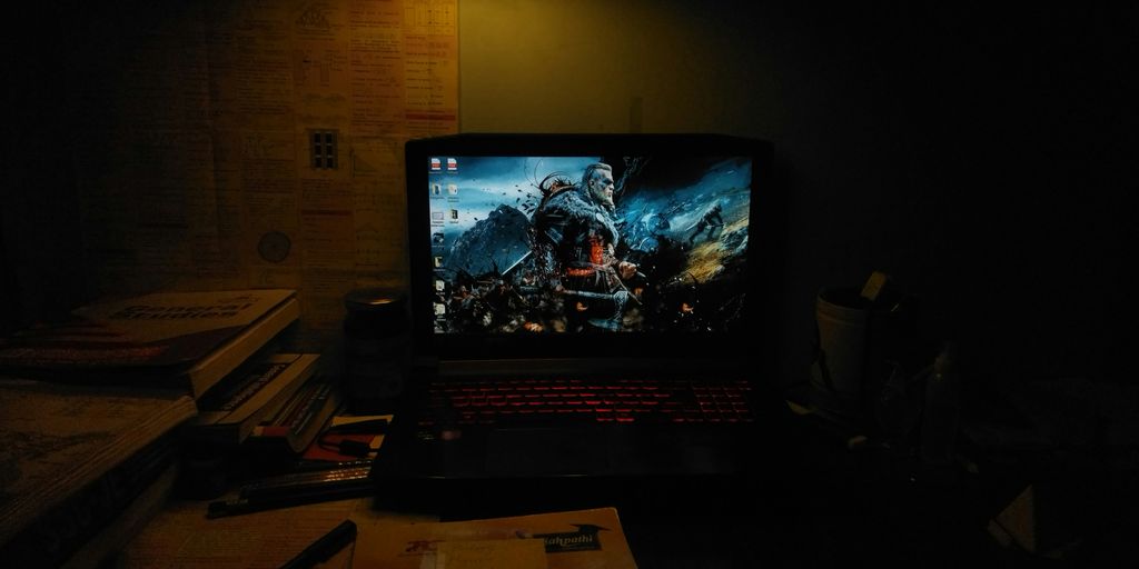 a laptop sits on a desk