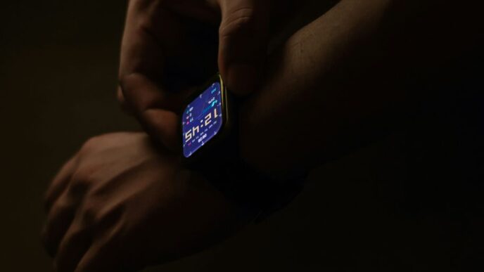 a person holding a smart phone in their hands
