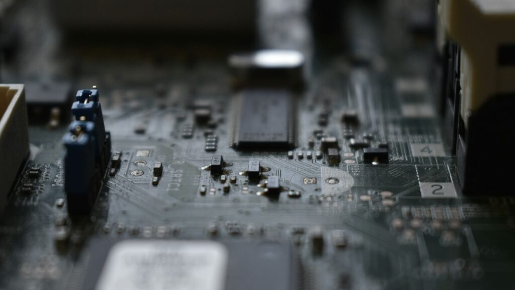 brown circuit board in close-up photography