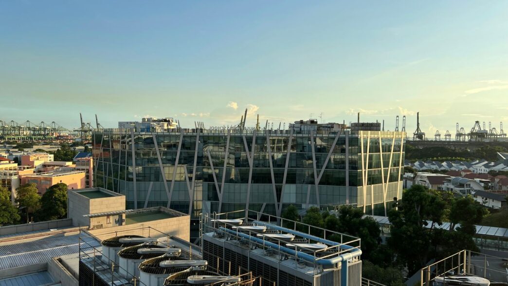 a large glass building with a large glass front