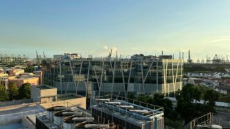 a large glass building with a large glass front