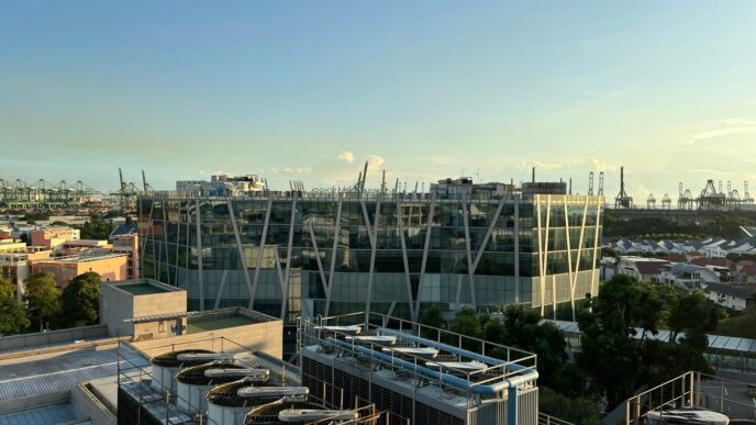 a large glass building with a large glass front
