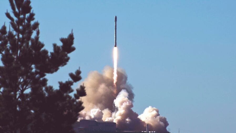 photo of space shuttle launching rocket