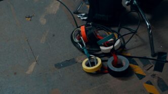 black red and yellow corded headphones