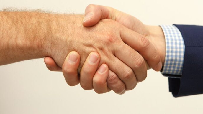 man and woman holding hands