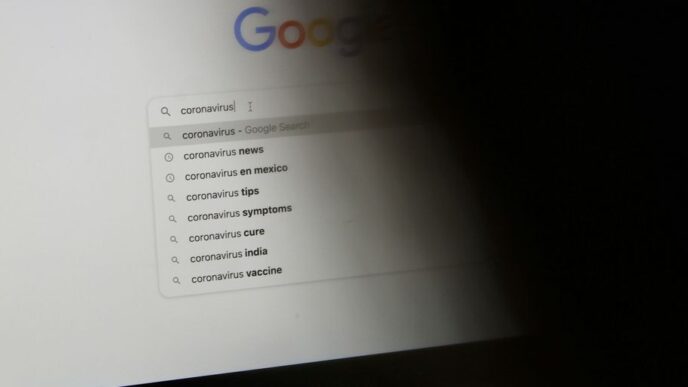 black laptop computer turned on displaying google search