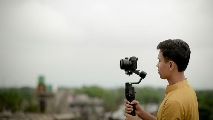 a boy holding a camera