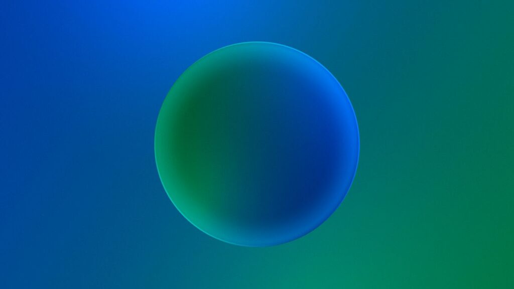 a blue and green background with a circular shape