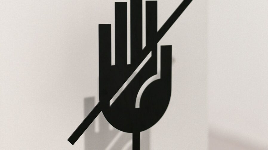 A black and white picture of a fork and spoon