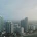 bird's eye view photography of high-rise buildings under gray sky