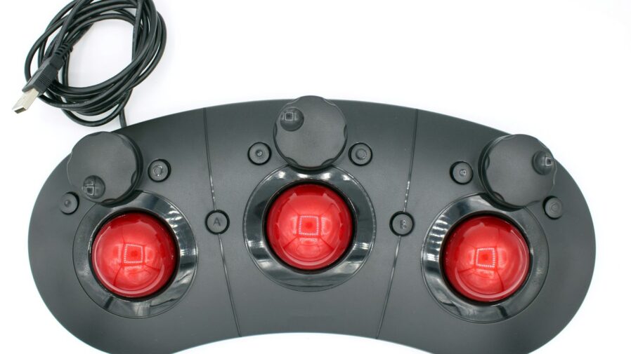 a close up of three red lights on a white surface