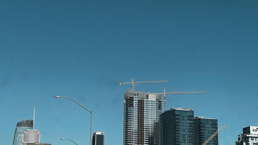 white and brown concrete building under blue sky during daytime