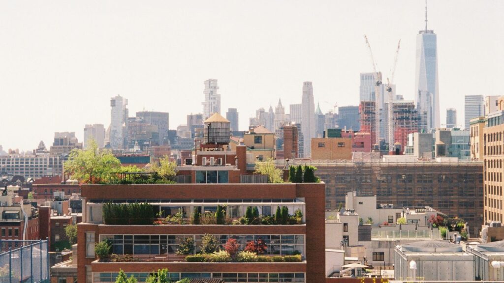 A new york city skyline view on a sunny day.